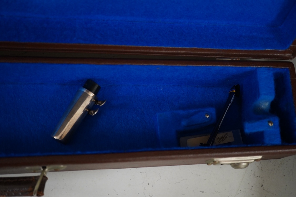 A cased Sonora soprano saxophone in a Rudall Carte branded case